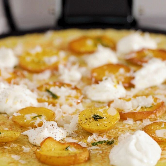 crepe with potatoes, parmesan creme, and rosemary